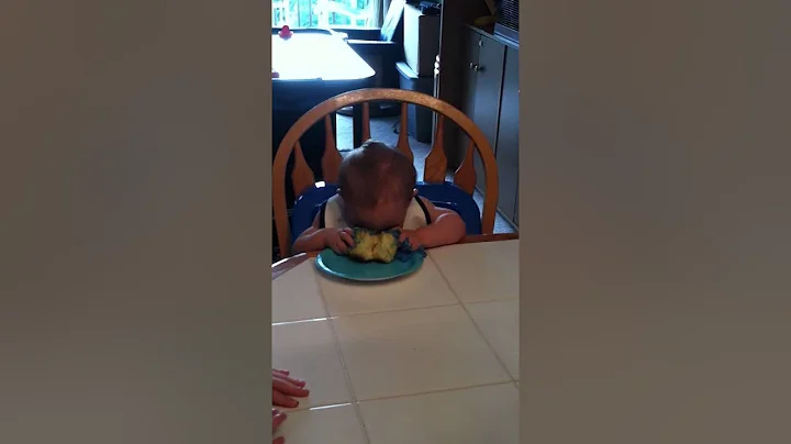 Daniel destroying his cupcake