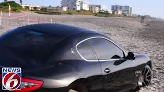 Police pursuit ends with Maserati stuck in sand at Cocoa Beach