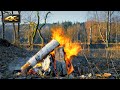 Feu de camp du matin prs de ltang gel ambiance naturelle et dtente