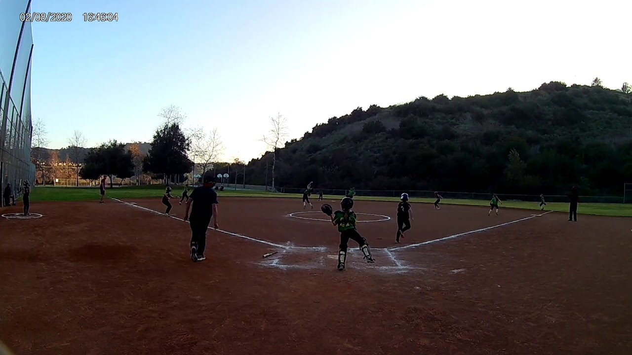 Softball pitcher leaping catch and double play YouTube