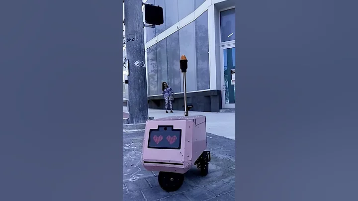 Robotic cart is going to cross a pedestrian in miami.