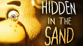 “Hidden in the Sand\\