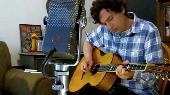 Craig Ventresco plays the blues on his Fraulini gu...