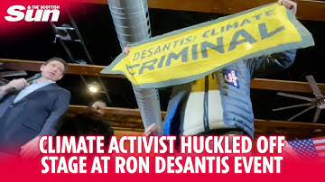 Climate activist dragged off stage by security during Ron DeSantis speech