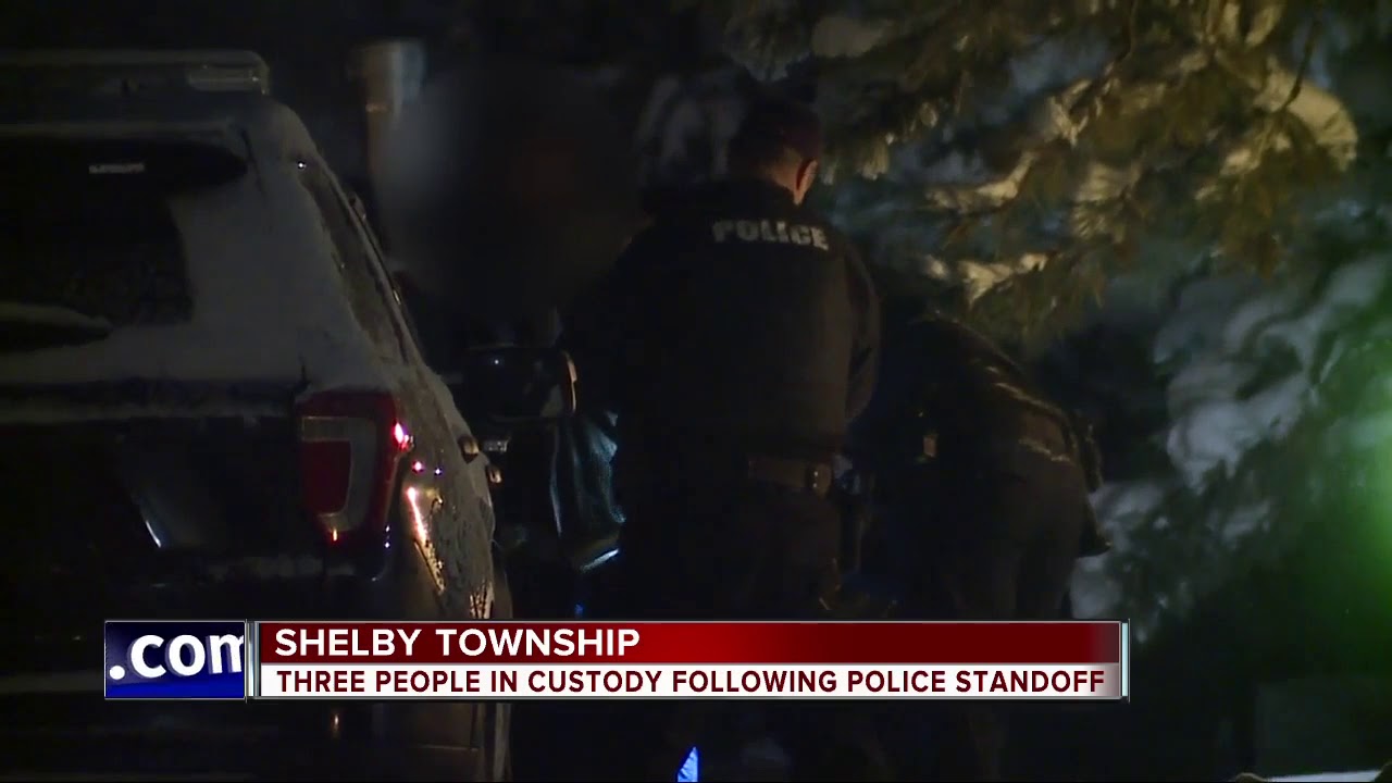 shelby township police spent wednesday night digging a... 3 people in custody following police standoff in Shelby Township - YouTube