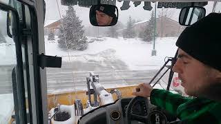 Inside a loader snow plowing