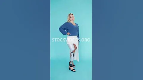 beautiful woman with prosthetic leg stan...