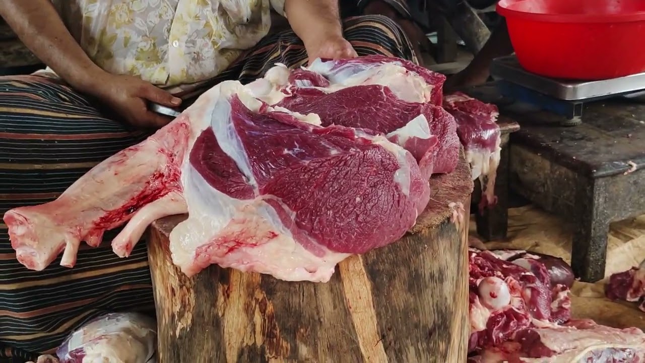 Cow meat cutting skills in Bangladesh butcher market. Long time beef cutting skills #
