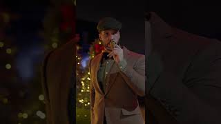 Tristan smoking pipe home bucharest driveway wearing brown Irish suit wearing hat