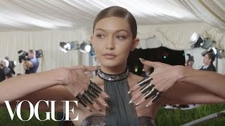 Gigi Hadid on Her Futuristic Bathing Suit and Chrome Knuckles | Met Gala 2016