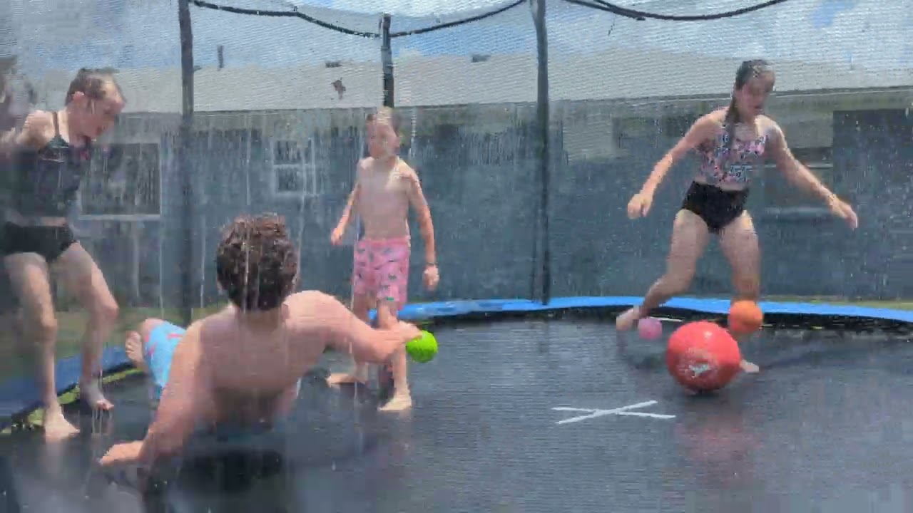 5-31-23 Todd, Lueree, Rylan & Aurora summer fun on the trampoline w/water.