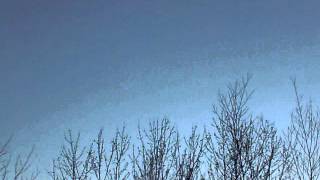 Airplane flying over Douglas, NB Canada, with a two plane escort(100_9221)
