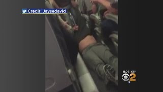 Shocking Video Shows Passenger Forcibly Removed From Overbooked Flight