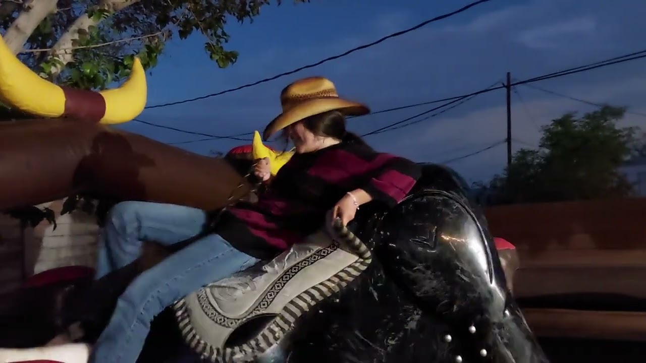 Mariana riding el torito #3