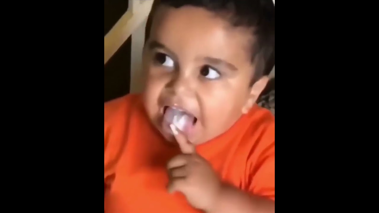 Kid meows while eating cake