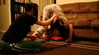 Trying to teach Sarah how to pop her butt. Hahaha.
