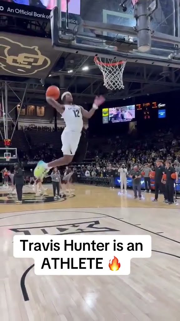 Travis is really in a full basketball uniform for this dunk ? (via Denver 7, @nick_rothschild/X)