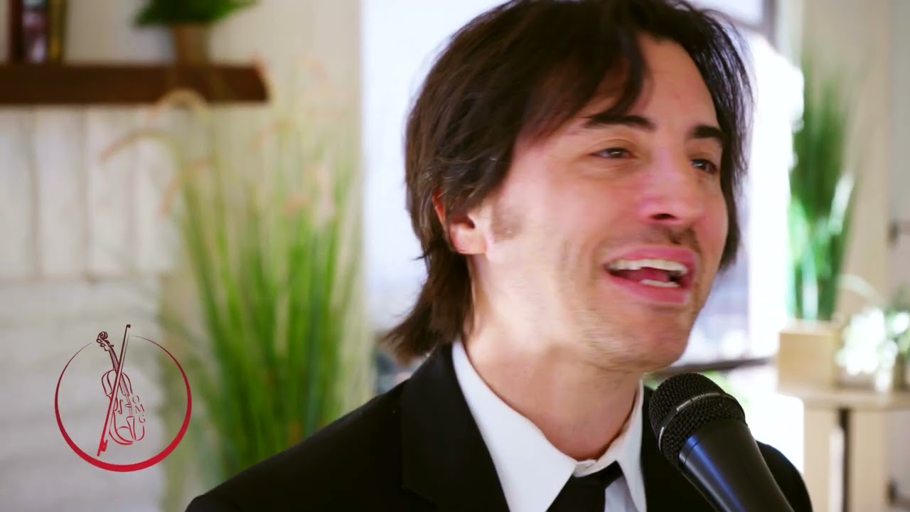 Matthew performing Rocket Man on piano and vocals