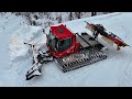 Pistenbully 400 Onboard and Drone view while Pushing Snow - Cummins Sound