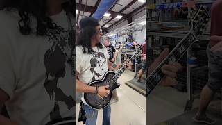 Slash GUNS N ROSES visits and tests guitars at Gibson #gunsnroses