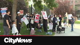 Newcomers rally for faster security screening wait times