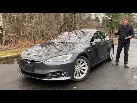 Vidéo: Combien coûte une Tesla Model S 60d ?