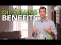 Coconut Oil Pulling Benefits and How to Do Oil Pulling | Dr. Josh Axe