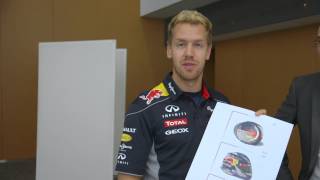 Sebastian Vettel Congratulates The Winner Of The Abu Dhabi Helmet Design Competition