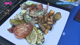 Chef Steven Leake serves up lobster with herb butter
