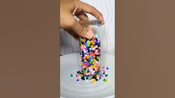 Playing with beads in a slow motion video. #slowmotion #shorts #satisfying #beads