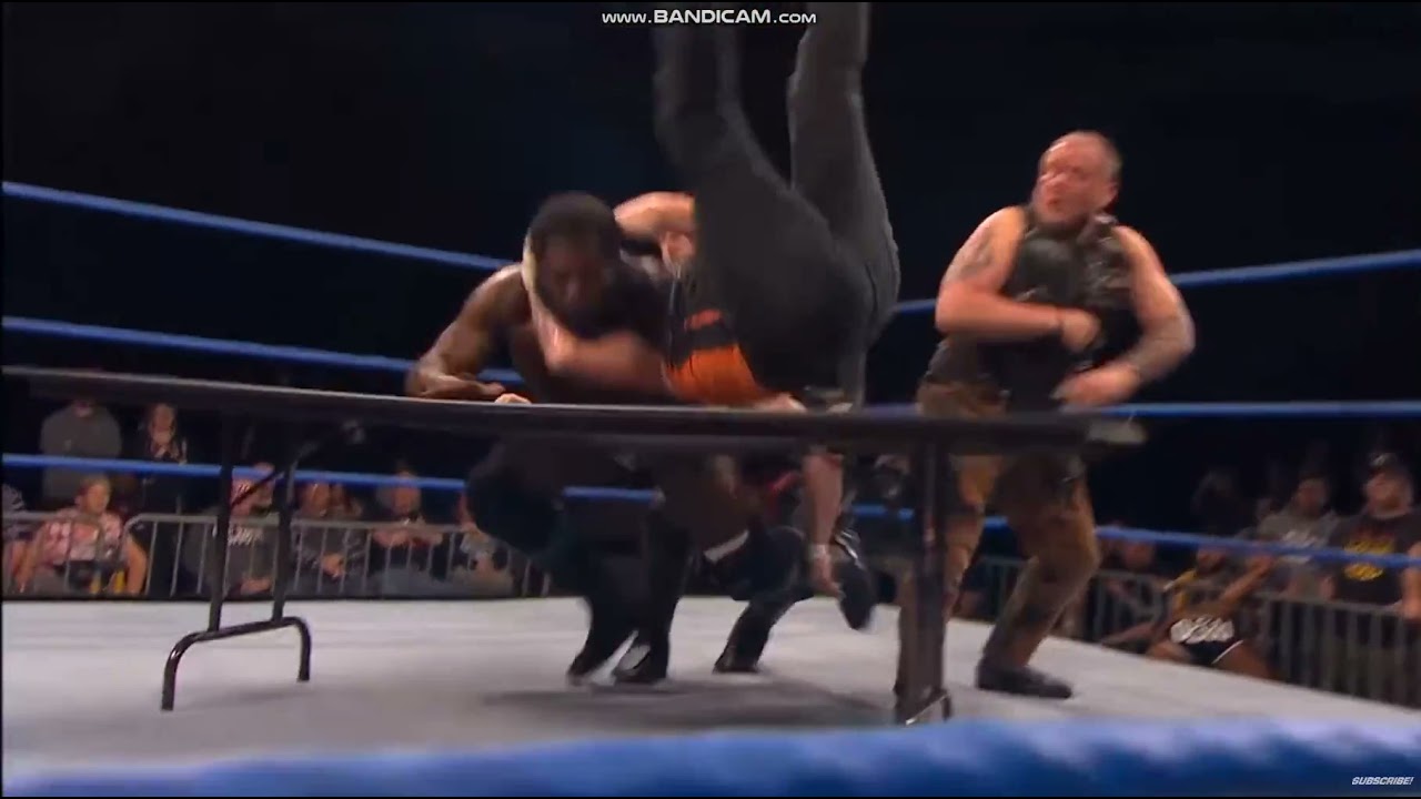 Jake Crist cutter on Willie Mack through table