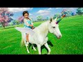 OAK RiDES A REAL UNiCORN AT OUR HOUSE!! Surprise UNiCORNs show up and Oak gets to feed it! Mp3 Song