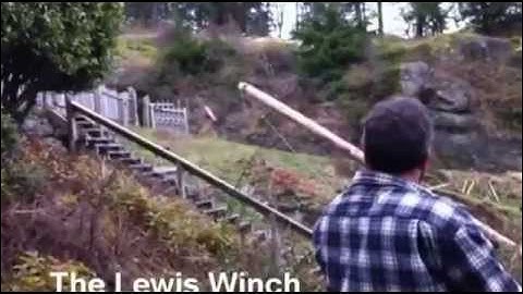 Lewis Winch skids huge 50 foot long salvaged logs up a steep hill, beachcombing
