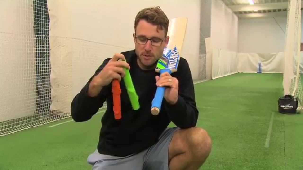 How do you put a new grip on a cricket bat?