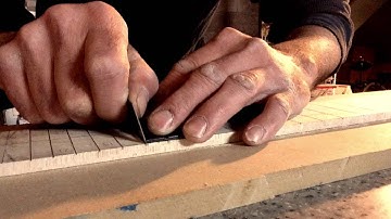 Freehand fretboard slotting