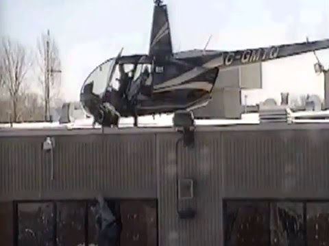 Security camera video of prison break with a helicopter