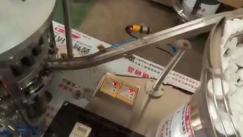 Liner and plastic cap assembly macine