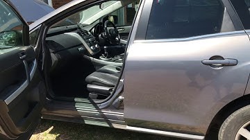 Mazda CX-7 footwell wet air-con drain