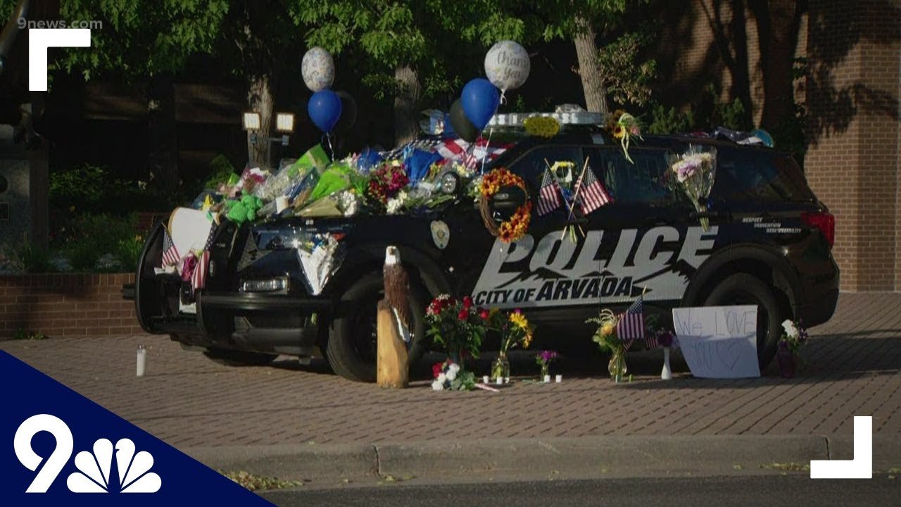 Growing memorial in Arvada for Officer Gordon Beesley YouTube
