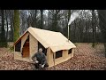 Inflatable house with woodstove camping in largest tent i own