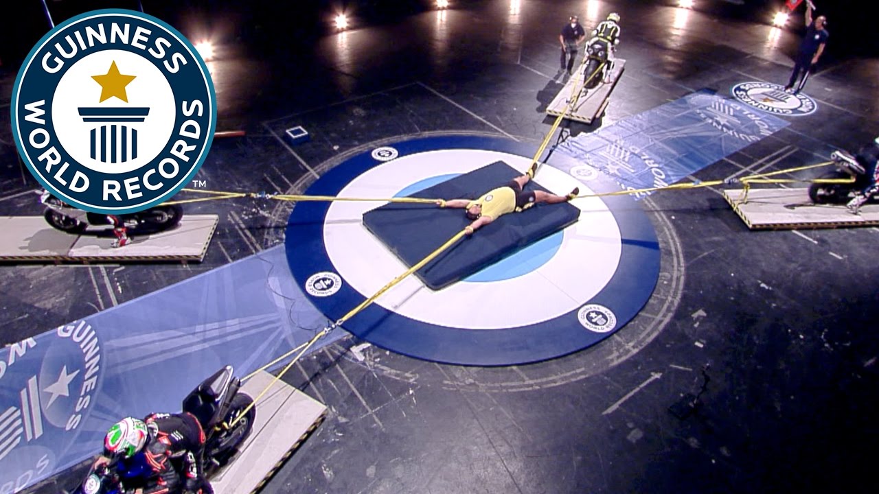 Longest duration restraining four motorcycles - Guinness World Records ...