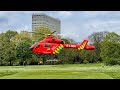 Emergency response air ambulance hovers in london royal park
