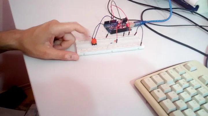 arduino push button like a switch