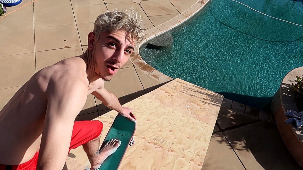 WE BUILT A GIANT RAMP FROM OUR ROOF INTO THE POOL!! *insane*