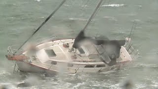 Two boats wash up on South Portland's Willard Beach during October nor'easter