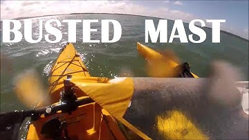 Snapped mast Hobie Tandem Island at sea
