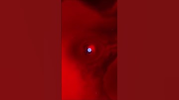 Neutron Star Inside a Red Nebula