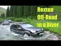 SsangYong Rexton crossing a Kensu river ford in an off-road trip