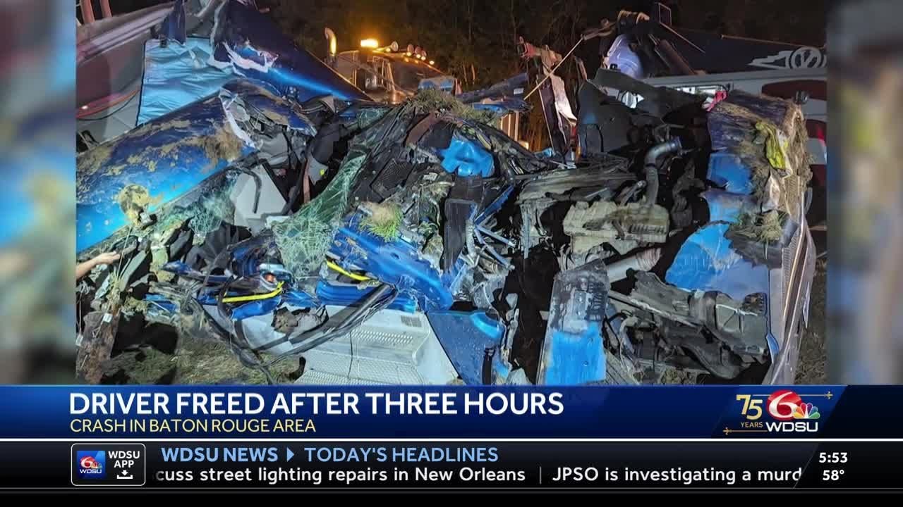 Driver freed after three hours from overturned tanker truck. - YouTube