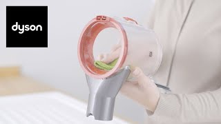 How to empty and clean the clear bin on your Dyson V8™ and V7 Advanced™ cordless vacuum